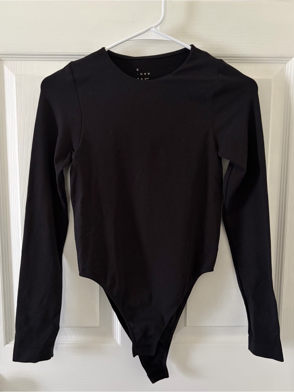 A new day Black Long-Sleeve Bodysuit — Simple Stretch Fit